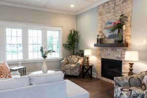 Living room with stone fireplace