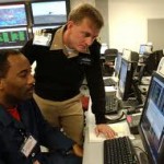 Men looking at computer